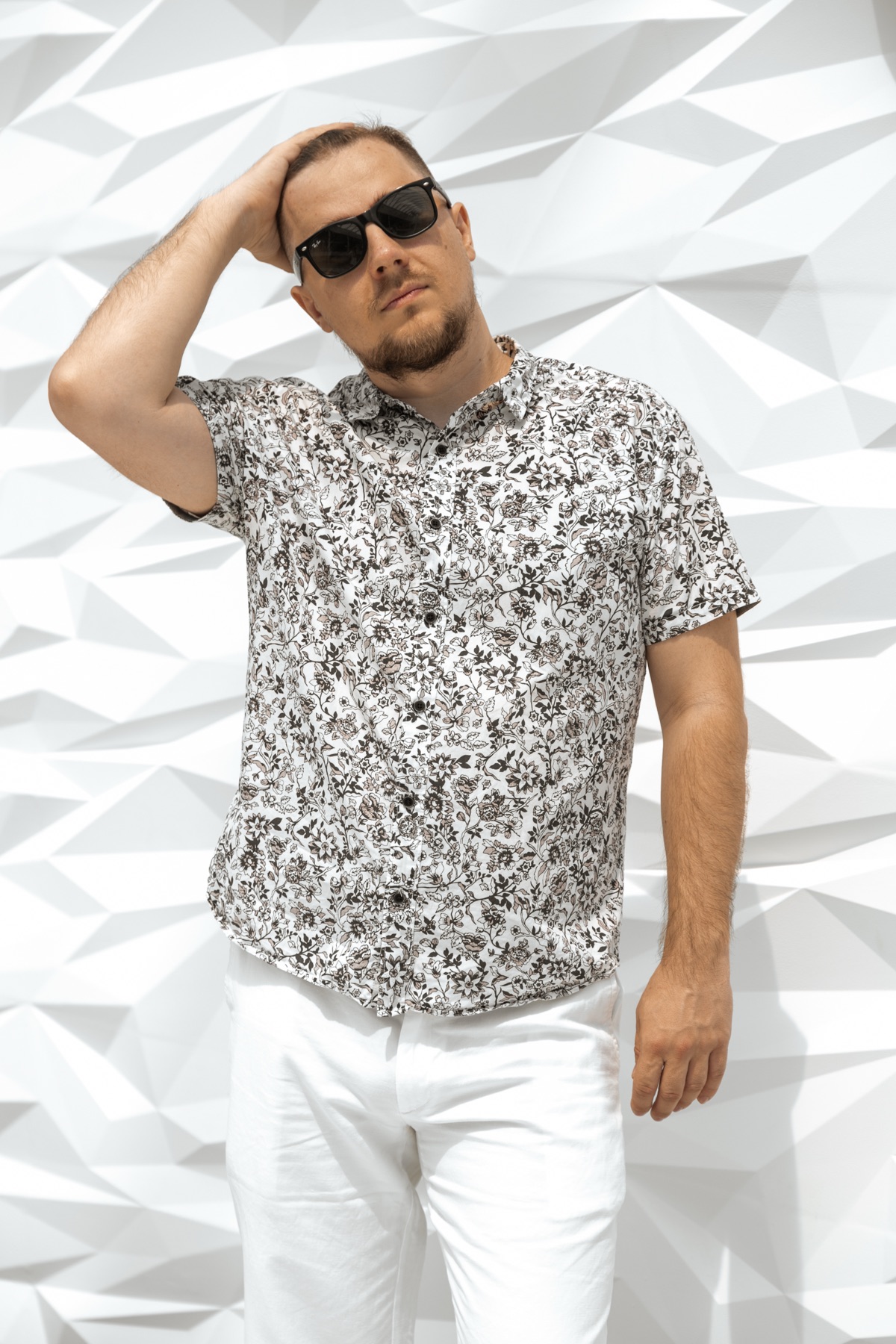 Ivan cool pose with geometric wall